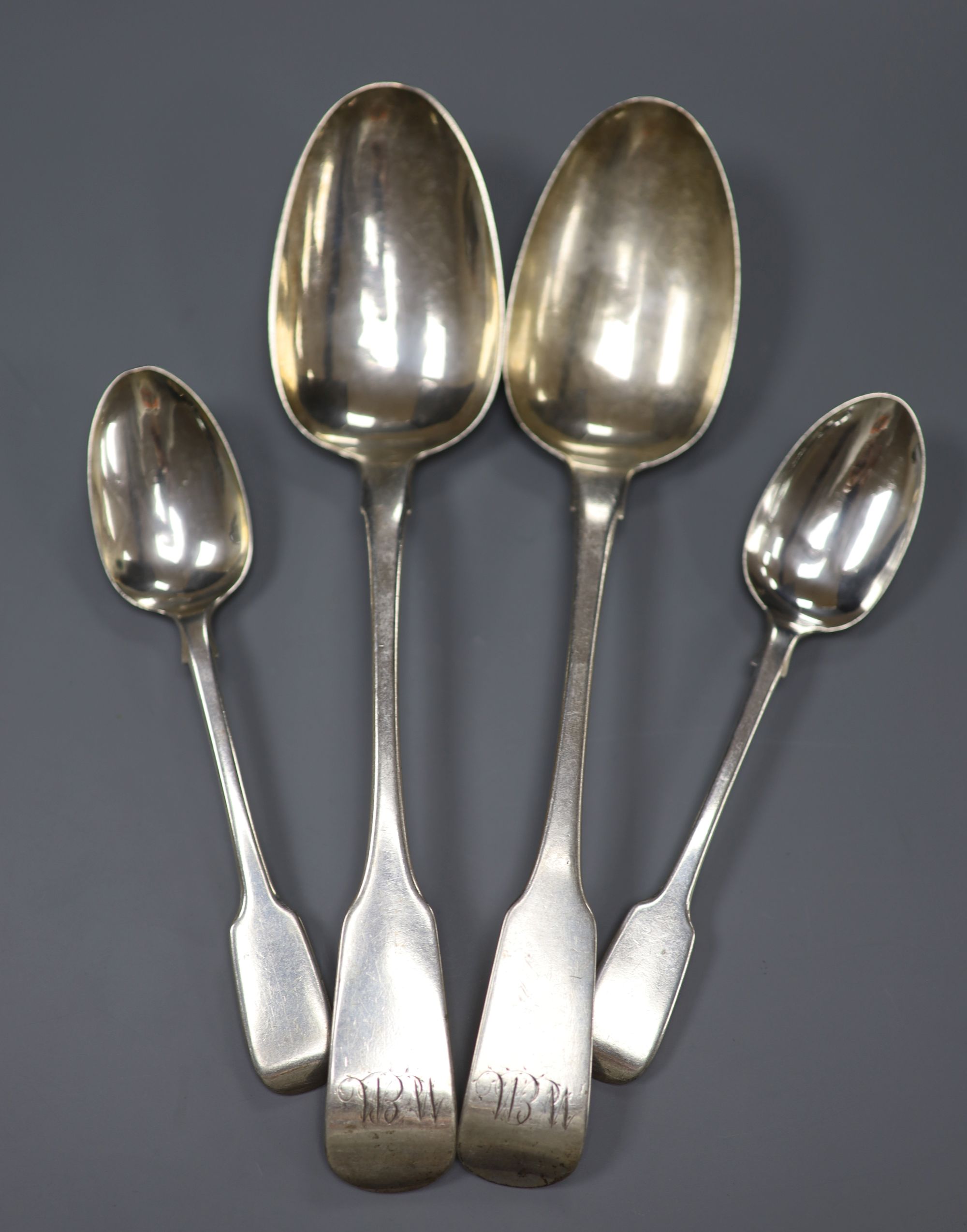 A pair of George III Irish silver fiddle pattern table spoons Samuel Neville, Dublin, 1816 and 2 others